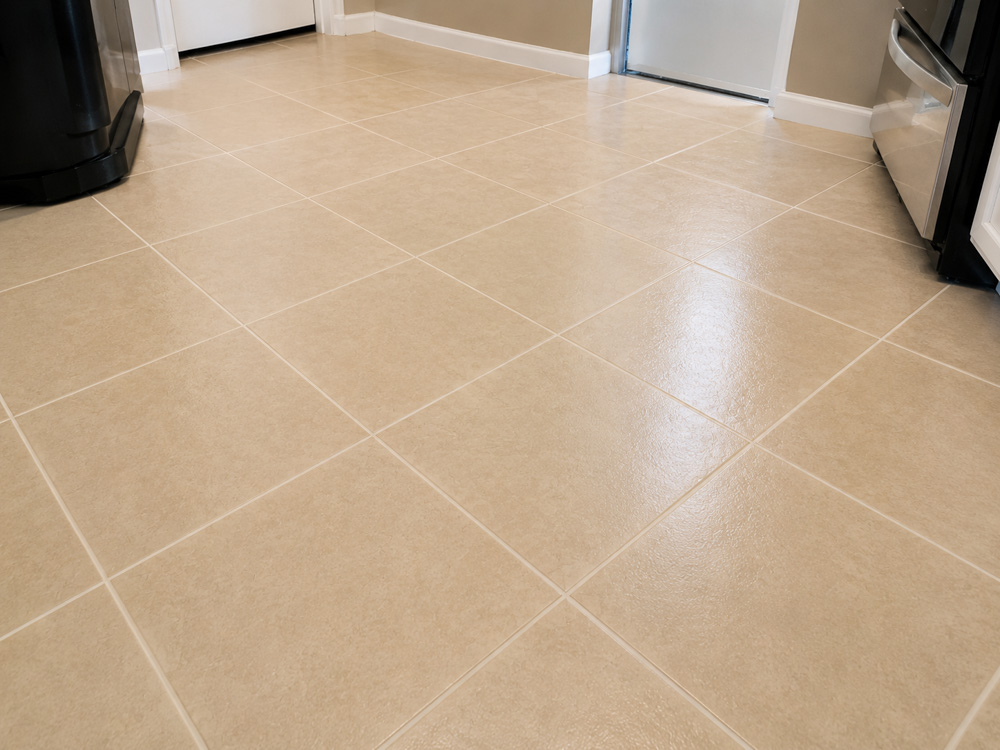 Kitchen floor tile and grout after professional restoration
